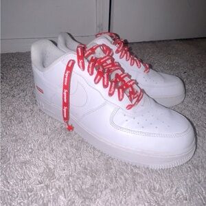 Supreme Air Force 1  on the right shoe the laces are messed up  (comes with box)